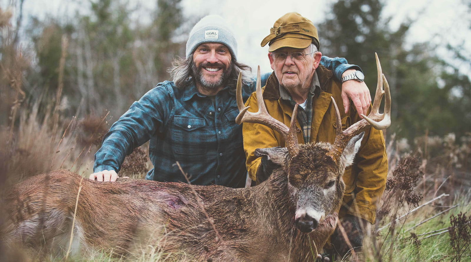 Donnie Vincent with his dad and his first buck