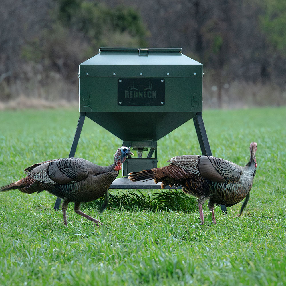 600 LB Automatic Deer Feeder drawing in some turkeys on a food plot.
